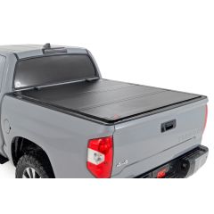 Rough Country Hard Tri-Fold Flip Up Bed Cover | 5'7" Bed | Toyota Tundra 2WD/4WD (07-21)